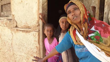 Kedija outside her house, Ethiopia